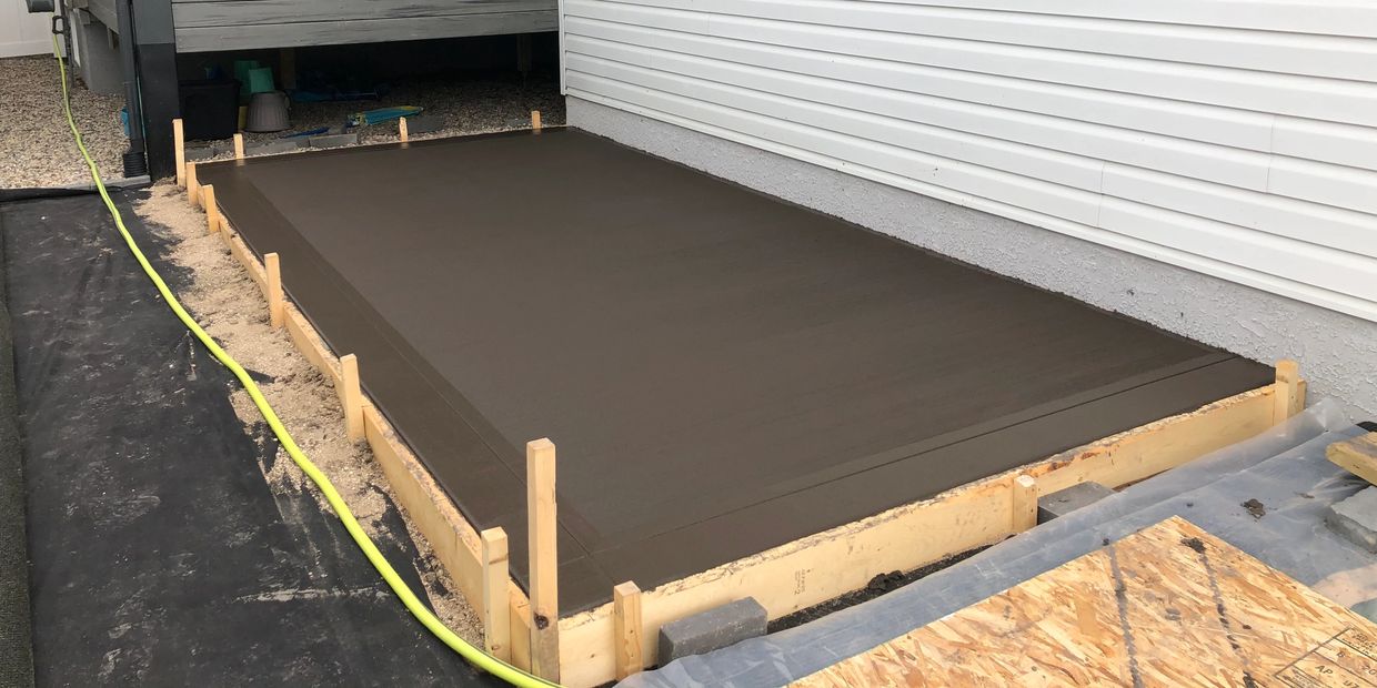 Smoke coloured patio for a hot tub.