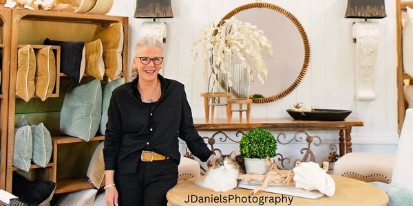 Owner smiling inside of store