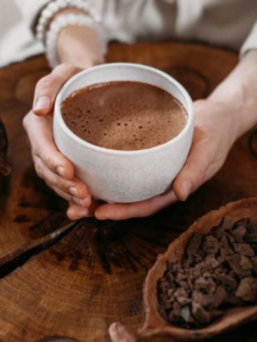 A cup of sacred cacao represents a cacao ceremony at our plant medicine apothecary.