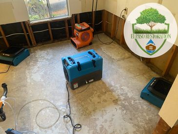 Blowers and dehumidifiers used for water damage repair.