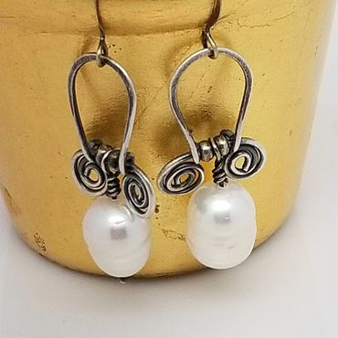 Sterling Silver Swirls and White Pearls
earrings. $55.00 USA Dollars
