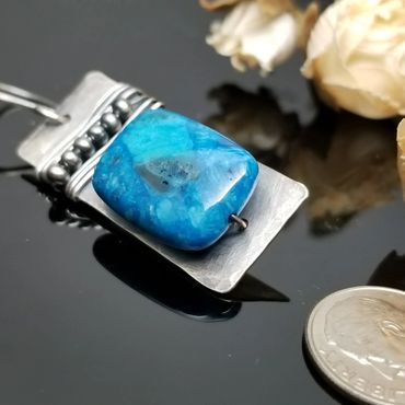 Sweet Silver Blues earrings. Sterling Silver earrings with turquoise square bead. $45.00 USA Dollars