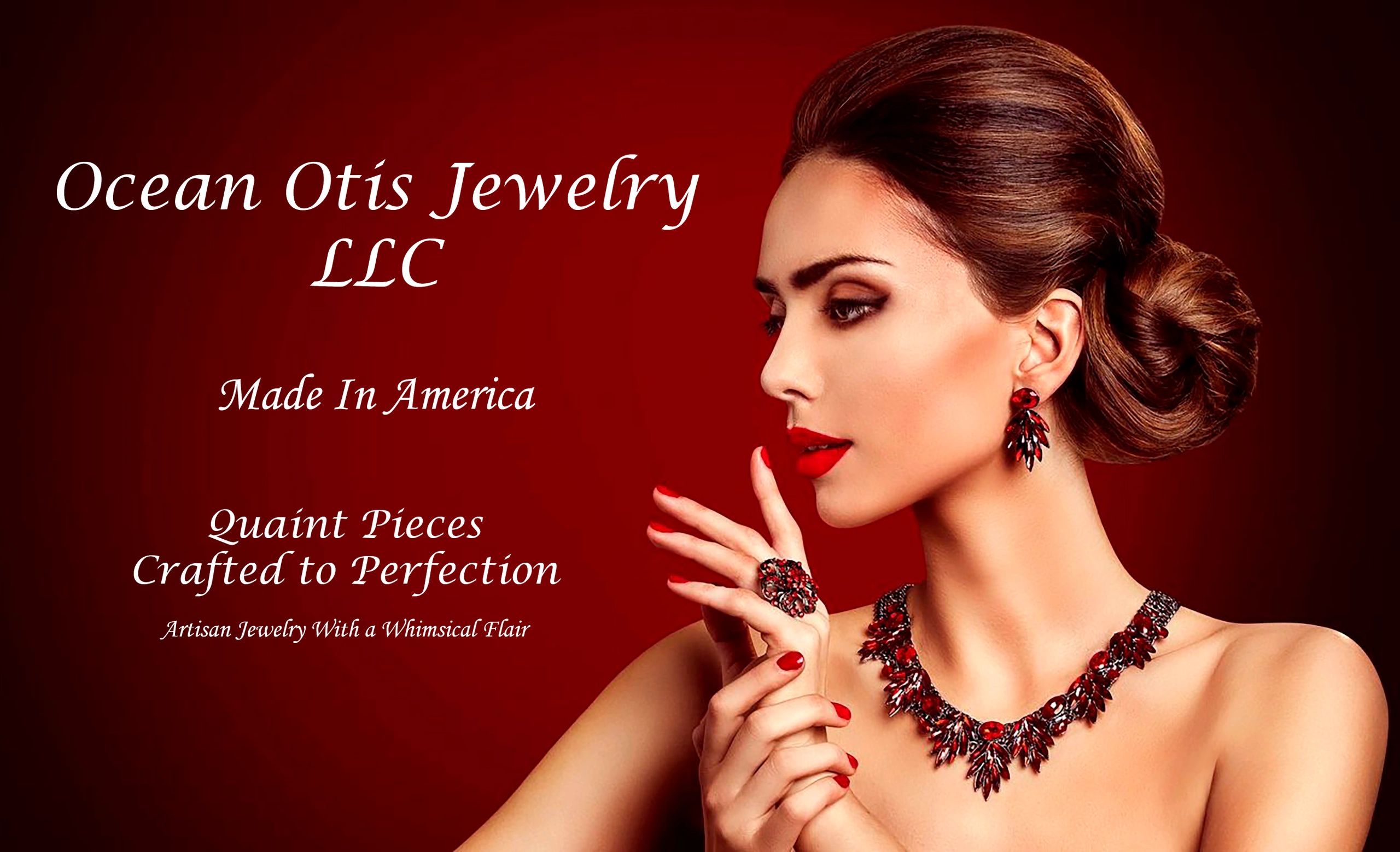 Elegant woman showcasing red jewelry by Ocean Otis Jewelry LLC.