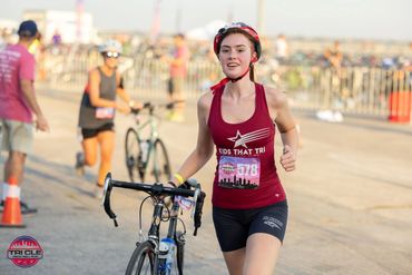 Gwen heading out on the bike