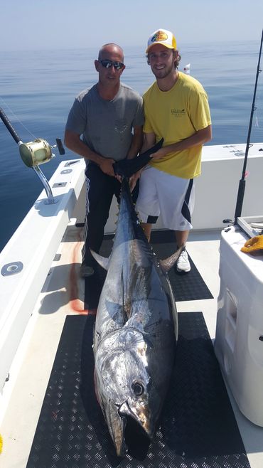 Proud father and son with their Giant Bluefin tuna caught off Gloucester MA.