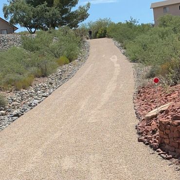 This is a chip seal overlay on cracked up asphalt