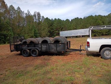 Hauling off a load of tractor trailer tires for a client.