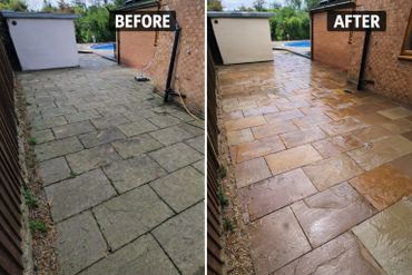 Before and after cleaning of a stone patio pathway beside a house.