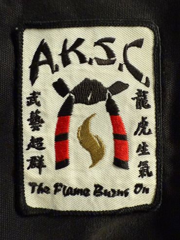 Bob White gave this Patch to Geoffrey Oropeza on his first Black Belt class