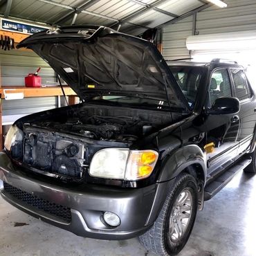 Toyota Sequoia being serviced.