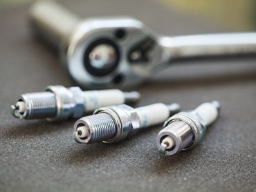 Automotive Tune Up. Engine Maintenance Service. Spark Plug Replacement.