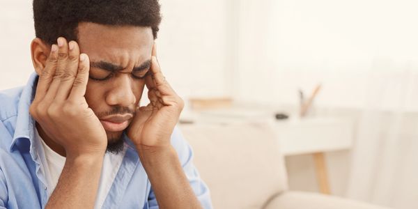 man with migraine