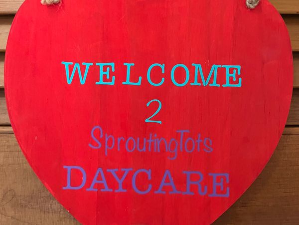 Welcome to Sprouting Tots Daycare sign 