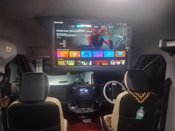Force Urbania Van rent Car interior with a large screen showing Spider-Man content.