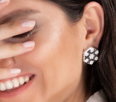 Fumul hexagonal white marble gold erring has Anatolian Tile motif with master craftsmanship.