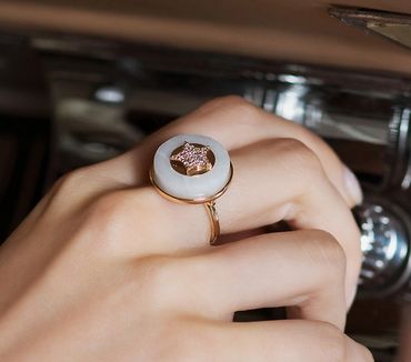 Fumul jewelry star charm ring in Ottoman white marble, 14k rose gold, and diamond.