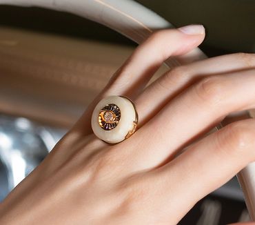 Fumul jewelry creates a unique evil eye talisman using marble in this rose gold and diamonds ring.
