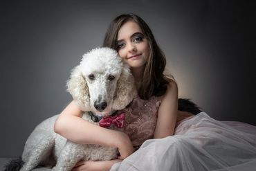 Fine Art Portrait Editorial Vibe Charleston SC. White Standard Poodle with teen girl in an embrace