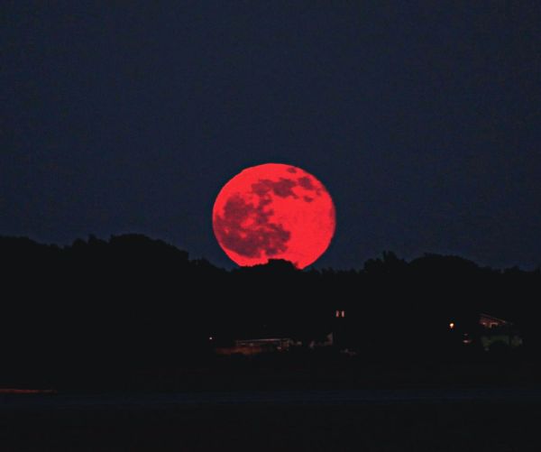 The full Strawberry Moon raising over Sullivans Island SC taken by Tonya Brisson brissonImagery.com