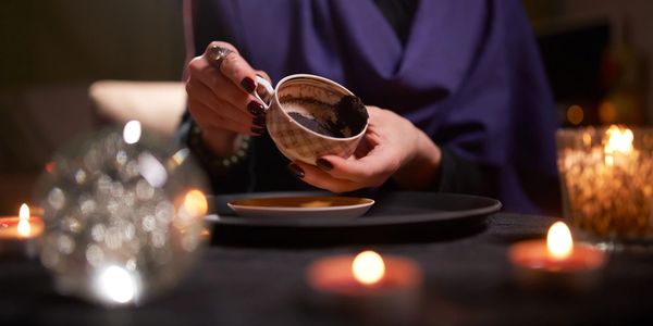 a woman reading in coffee.