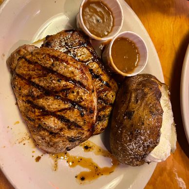 Texas Road House double chop…. Baked potato and butter…. Delicious!