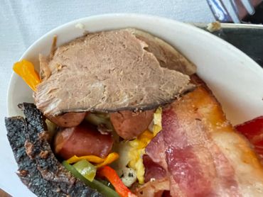 Roast beef, chicken, fresh fruit, great Sunday brunch.