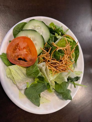 Salad with vinegrette sauce.