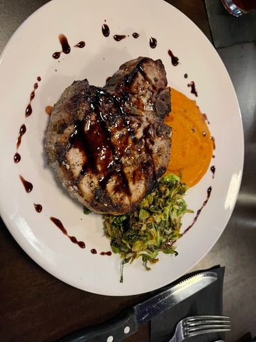 Porterhouse pork chop dinner.