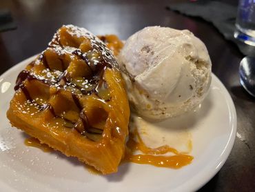 Waffle with pecan ice cream.