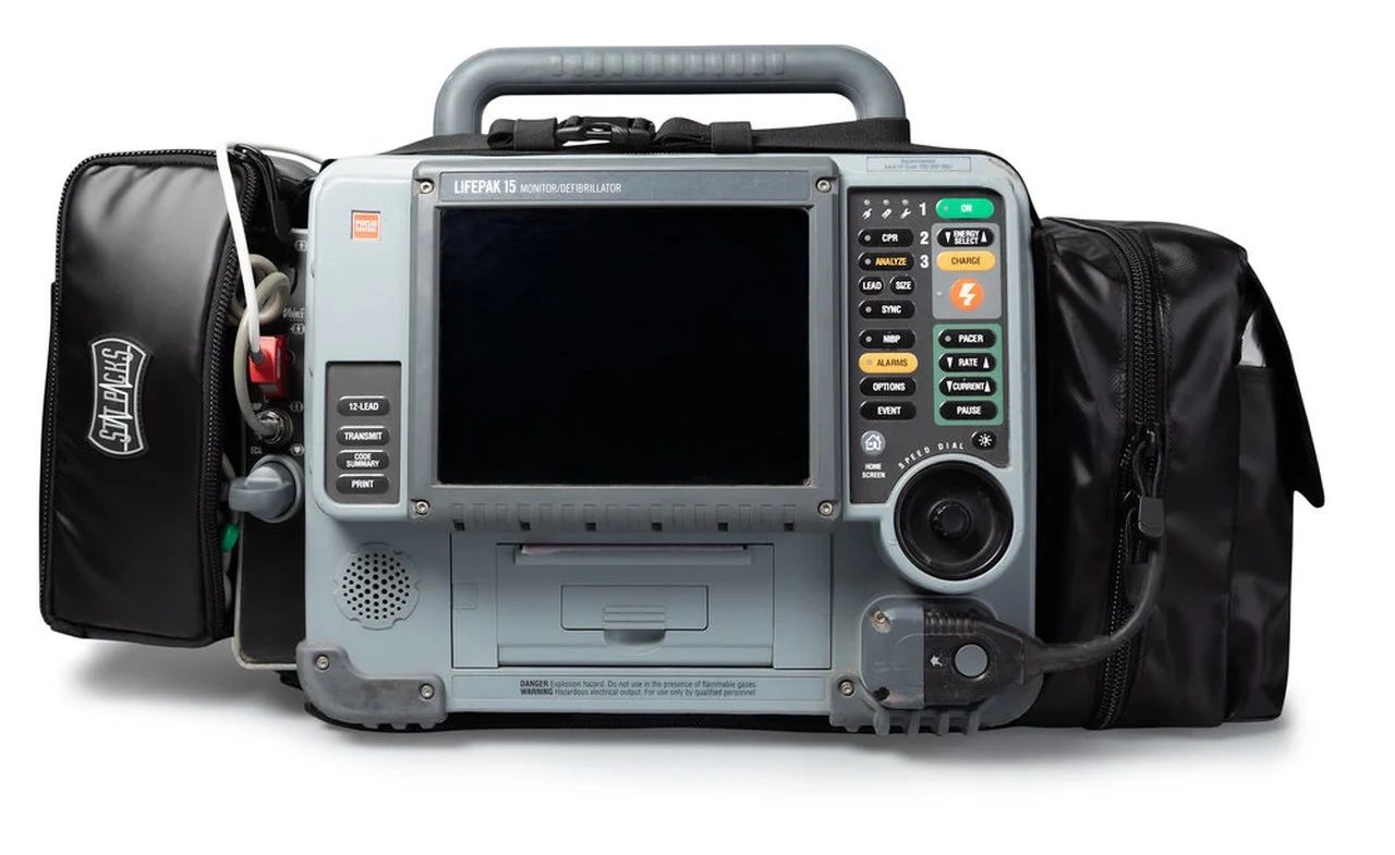 Portable LIFEPAK 15 monitor/defibrillator with control panel and screen.