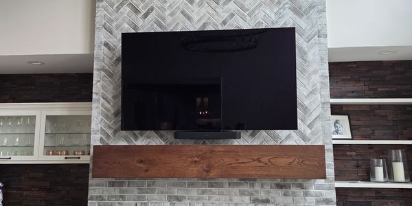 Modern living room setup with a wall-mounted TV.