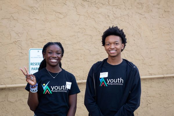 Ambassadors smiling before we open the doors to our event