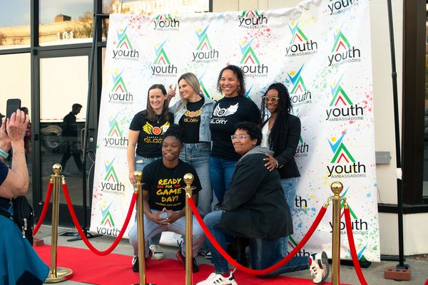 Kansas City Glory, Women's Tackle Football Team smiling on our red carpet