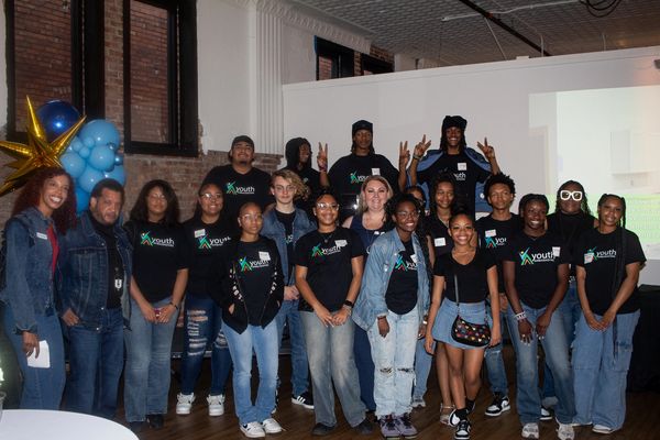 Our teens and staff smiling after a successful event