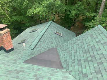 New Owens Corning Shingle roof with skylights