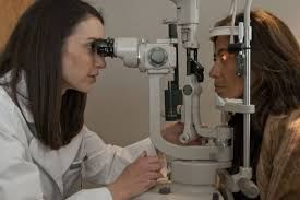 Karen Bassichis Saland, MD examining a patient.