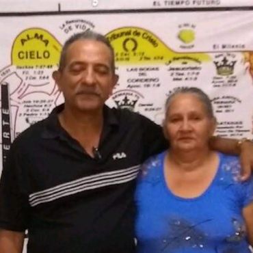 Angel & wife Orfelina Cuban donations recipients.