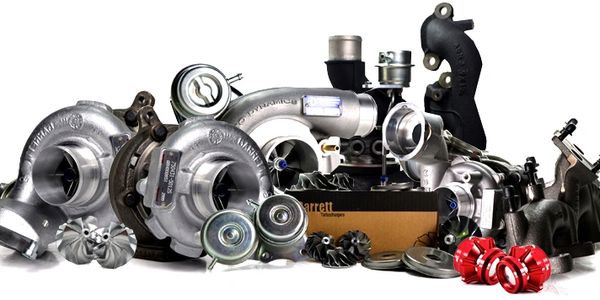 a bundle of turbochargers, wastegates, compressor wheels, turbine wheels, and exhaust manifolds.