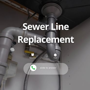 Close-up of plumbing pipes under a sink with a call prompt for sewer line replacement.