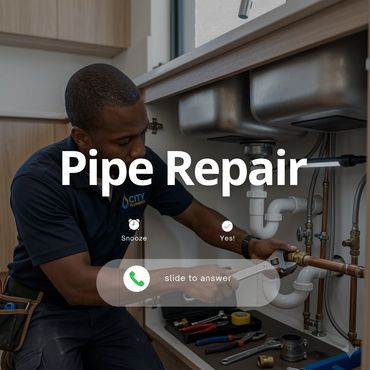 Plumber fixing pipes under a kitchen sink with tools around.