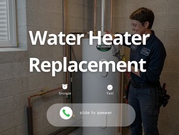Technician replacing a water heater in a basement.