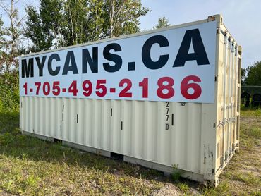 20 foot shipping container with sign on it