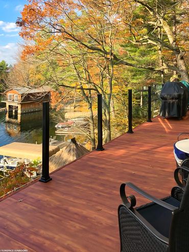 Beautiful deck with sleek glass railing