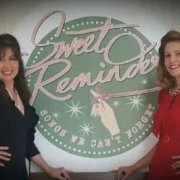sweet reminders (2 white females) standing in front of the sweet reminders logo