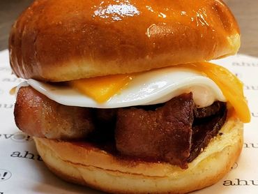 BACON, EGG & CHEESE
 dry aged cherrywood smoked bacon, cage-free over easy large egg, cheddar