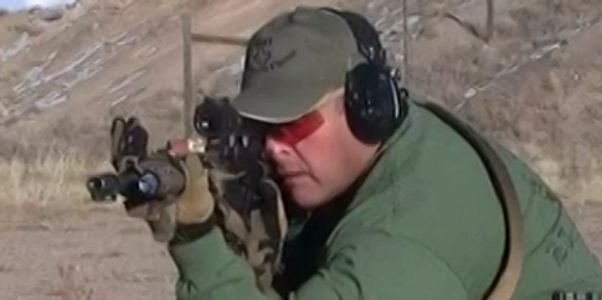 M4 or AR-15 style rifle employment using a kneeling position.