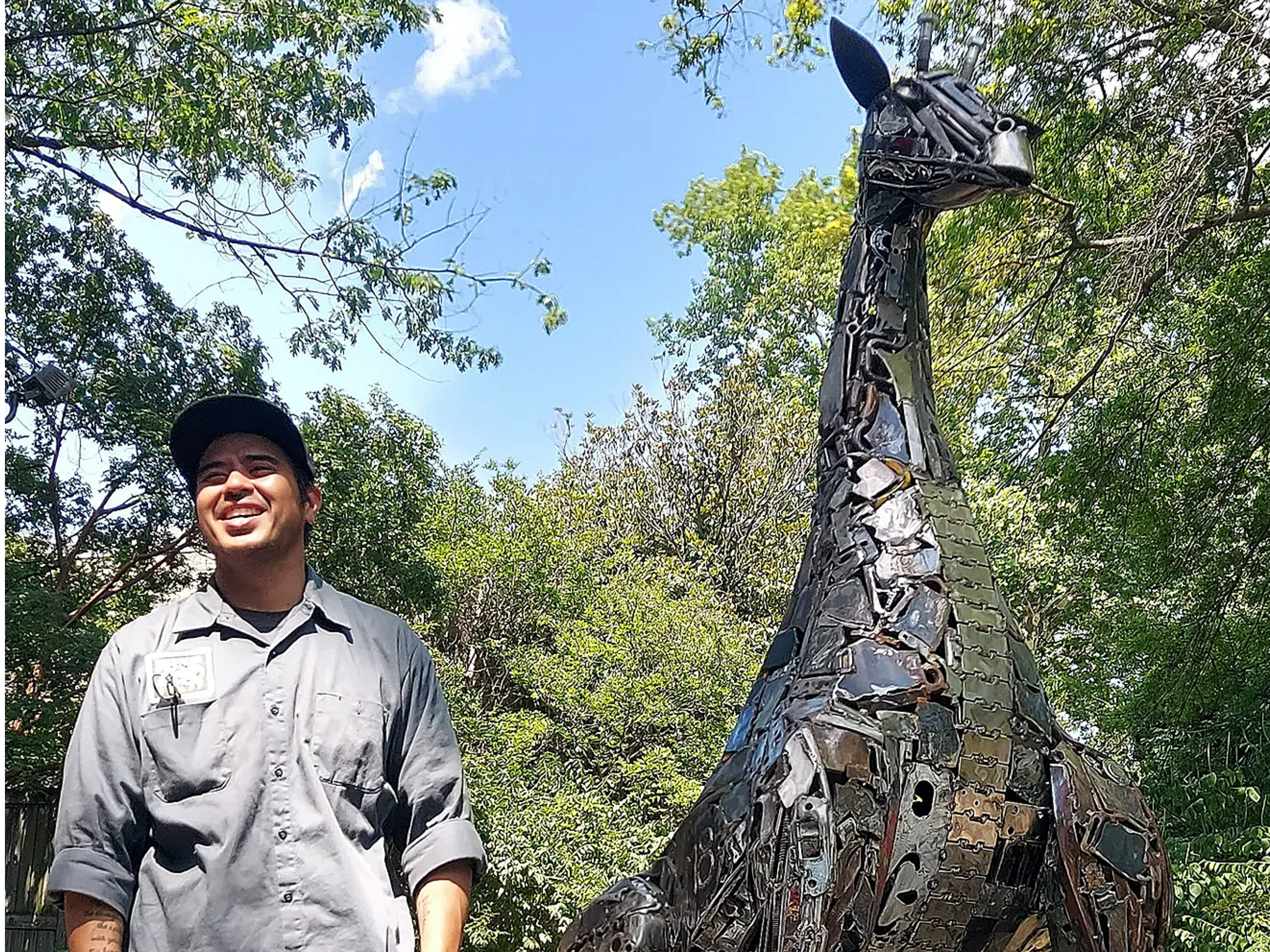 7 feet tall giraffe sculpture installed at the Philadelphia Zoo