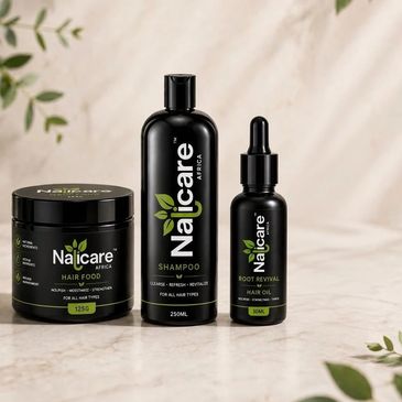 Set of Naicare Africa hair care products on a marble surface.