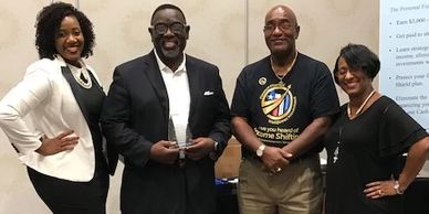 A group of black Leaders in a pass event.