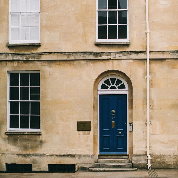Blue front door on an Oxford street